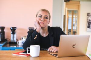 blonde woman looking bored