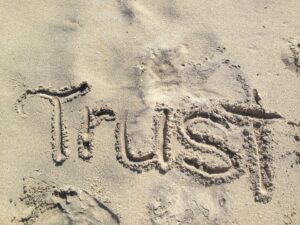 trust written in sand